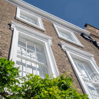Paintwork on tall windows of Islington house