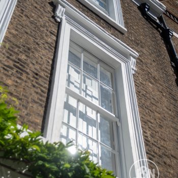Clean, white windows of Islington house